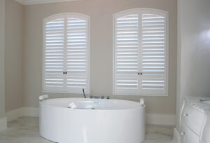 Norman White Arch Shutters Bathroom - window treatments